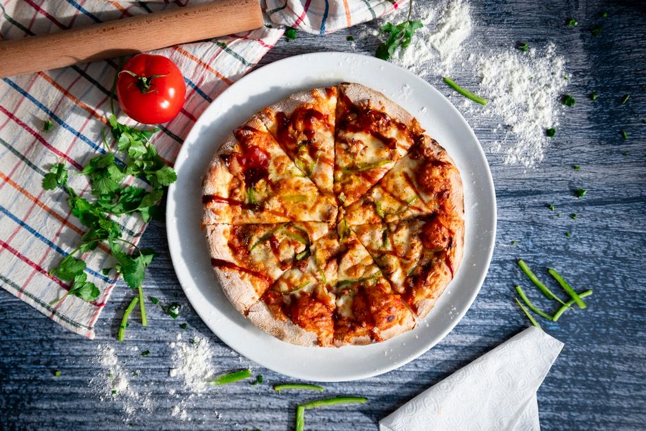 Budget tabletop gas pizza oven on a small patio table